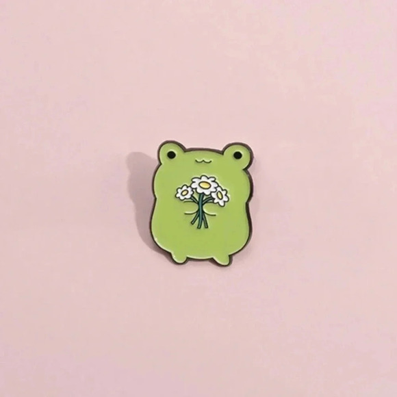 1 piece unisex green frog with white yellow flowers enamel pin backpack clothing - Picture 4 of 5